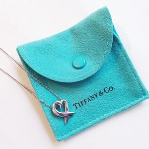 Tiffany & Co. Sterling silver Paloma Picasso Loving Heart pendant necklace.